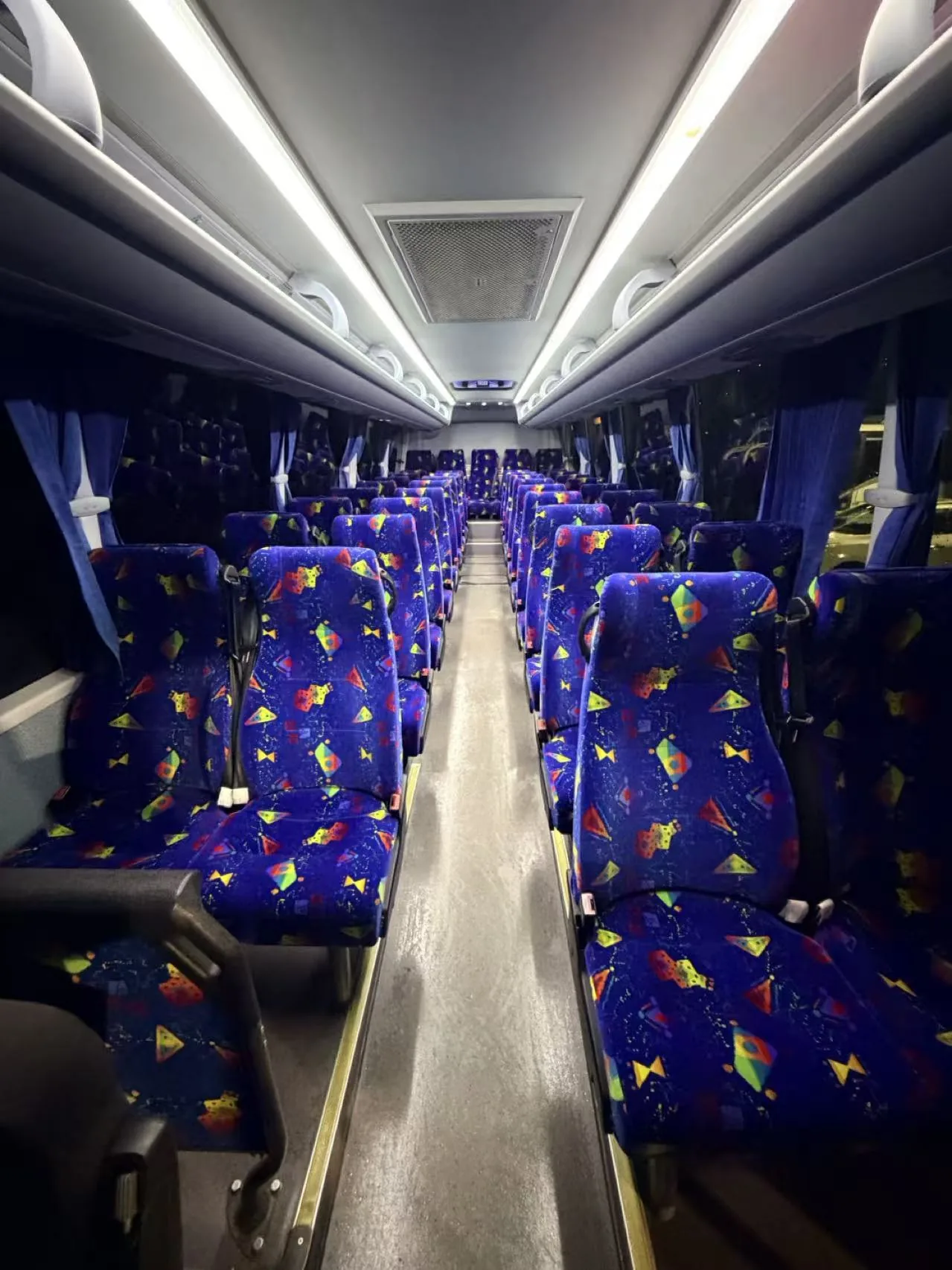 Bright coach interior with comfortable seats